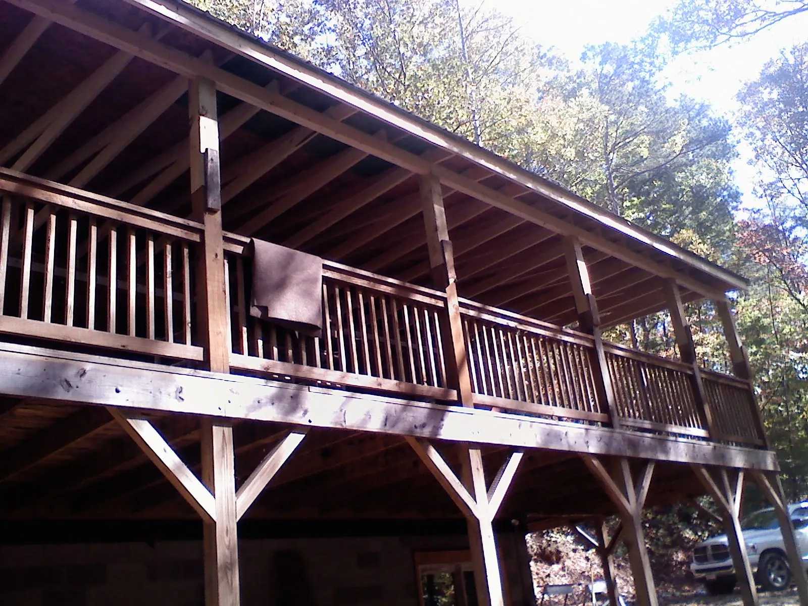 Timber framing under a new elevated porch and deck — Roof Leak Repair in Ledyard by Roofing Brothers